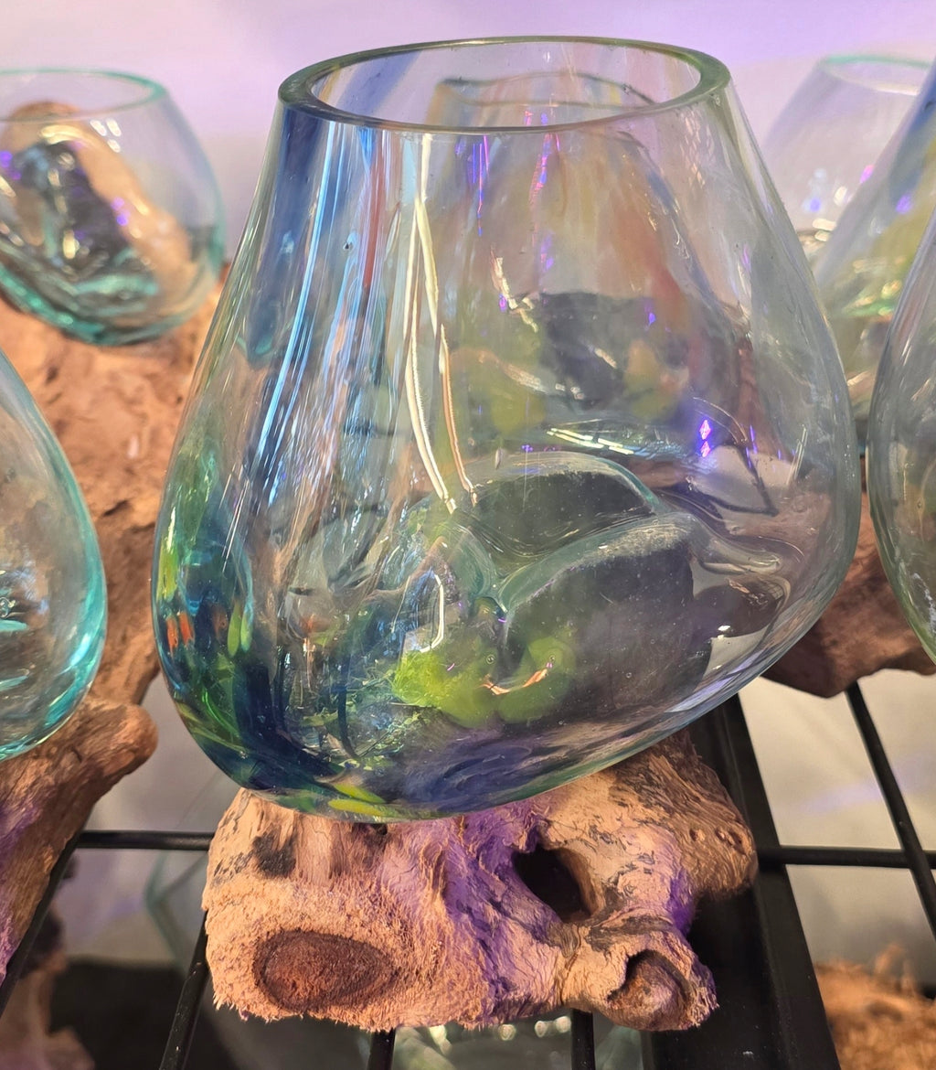 Coloured glass slump on Driftwood