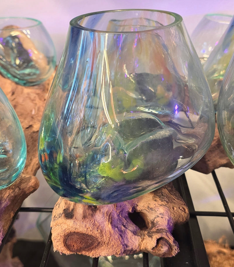 Coloured glass slump on Driftwood